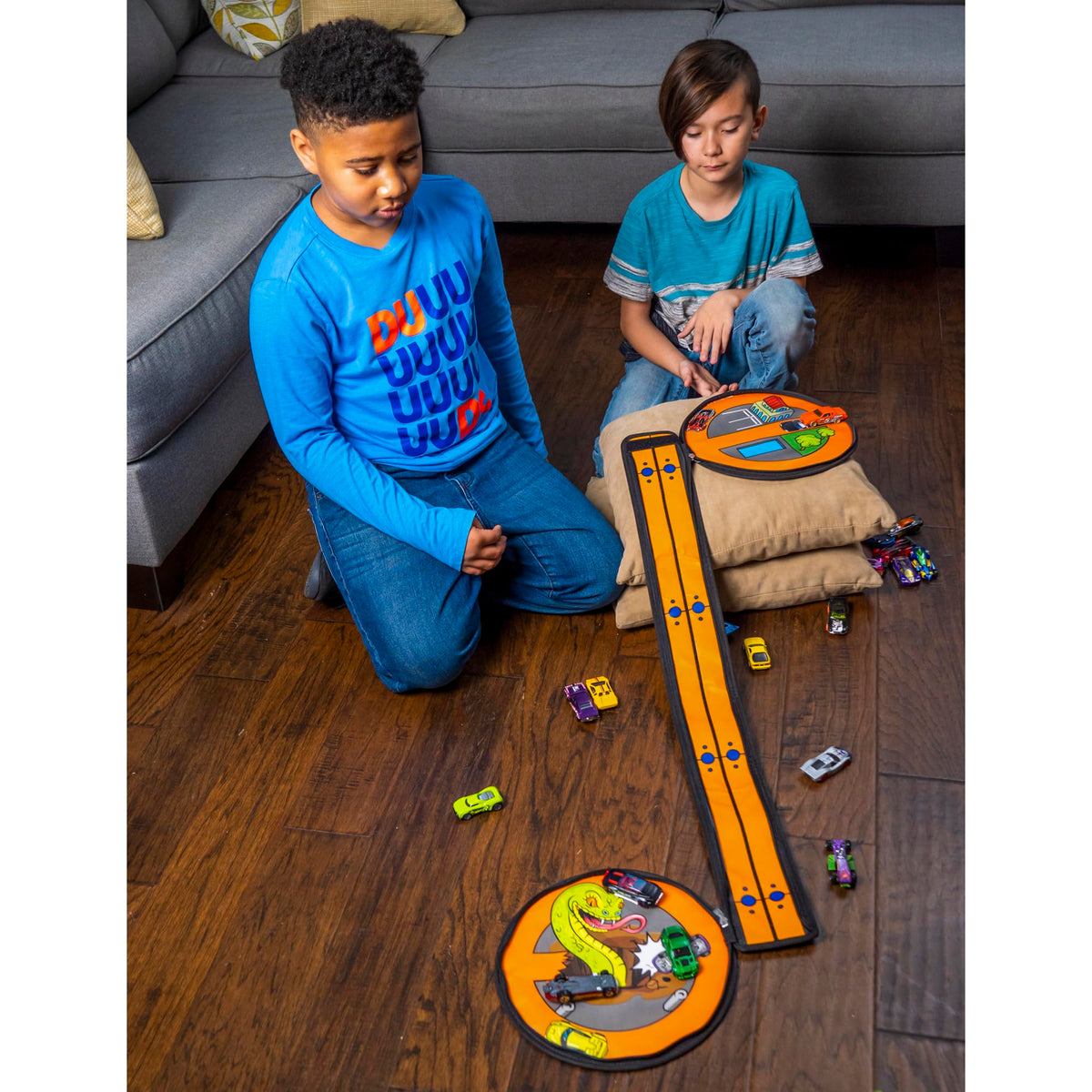 Hot Wheels ZipBin Wheelie Track Pack - Portable Toy Car Storage, Ages 3+ | Unzips Into 35.5in Racetrack Play Mat, Holds 100 Cars, Circle Tire Design with Carrying Handles for Travel, Ages 3+